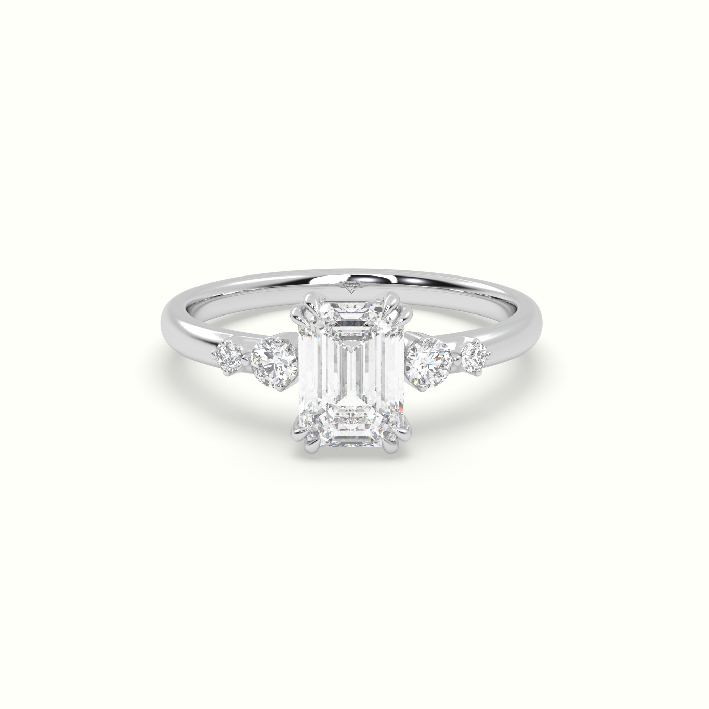 18k white gold emerald diamond solitaire side stone ring