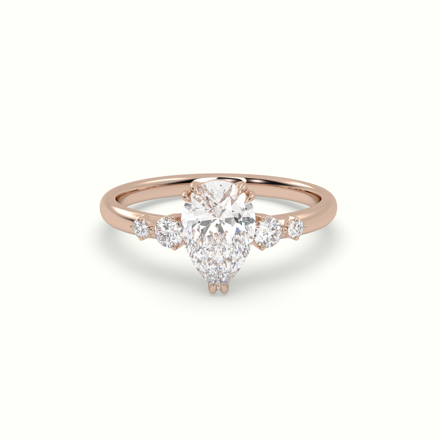 10K Rose Gold Pear Diamond Solitaire Side Stone Ring